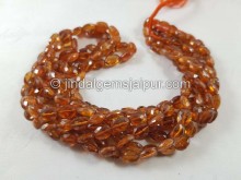 Spessartite Faceted Oval Beads